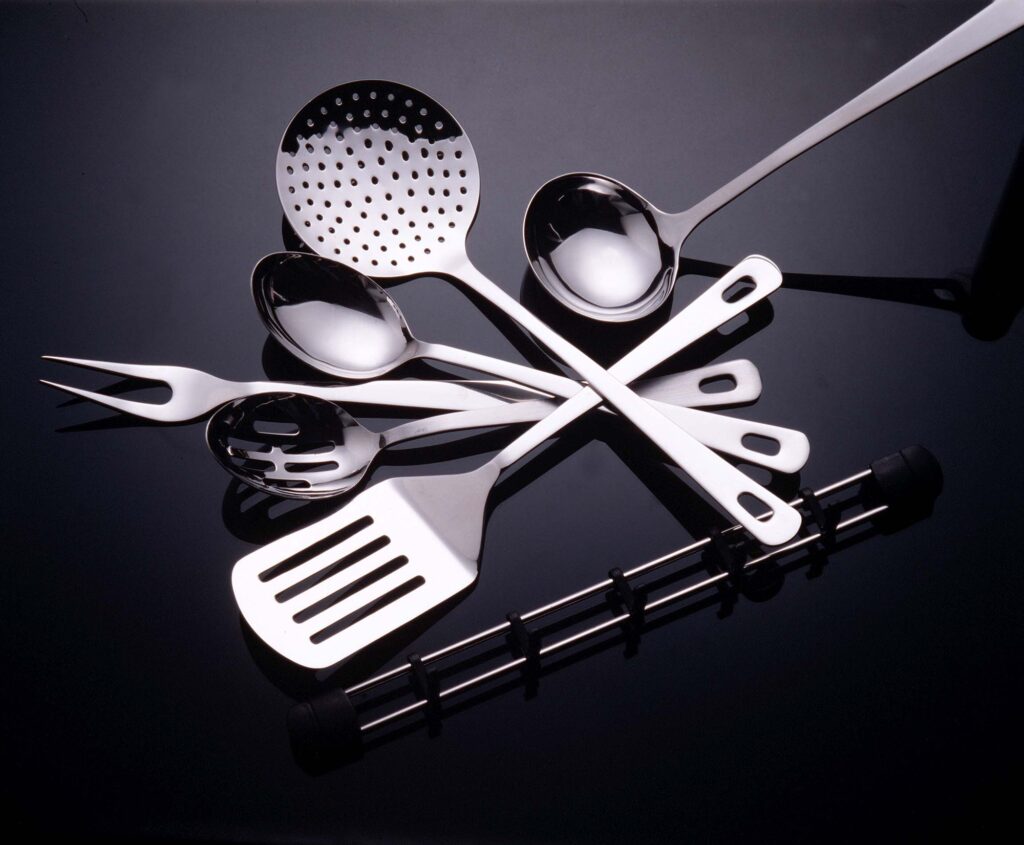 Stainless steel kitchen utensil set: ladles, skimmer, spatula and serving fork